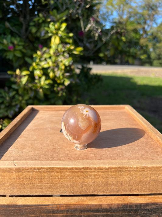 Flower agate carnelian sphere