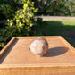 Flower agate carnelian sphere