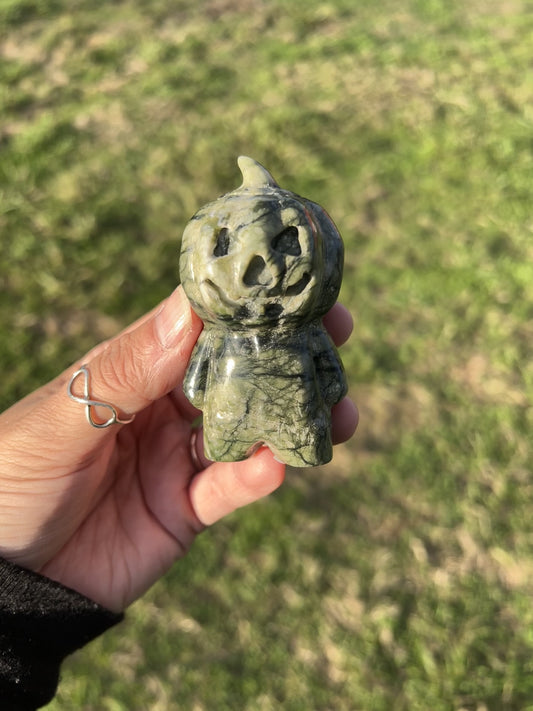 Serpentine pumpkin head carving option C in natural green stone